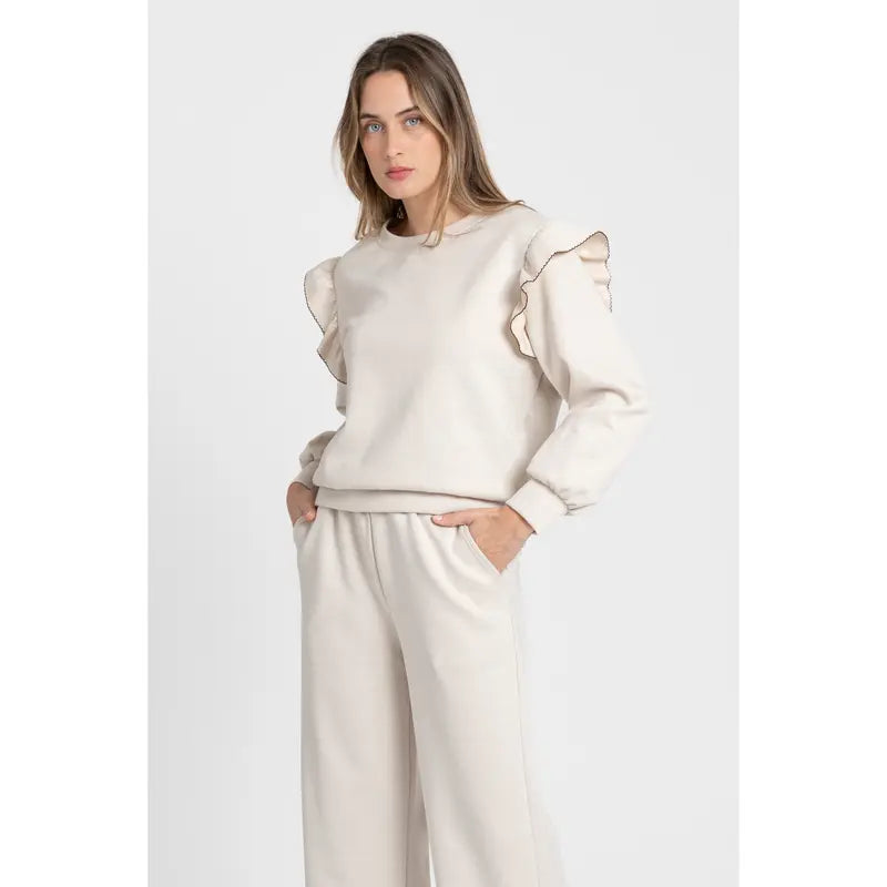 Women's tracksuit with ruffled top and trousers