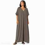 Women's oversized flowy V-neck maxi dress, chic and comfortable for summer, in a light and soft fabric for all occasions