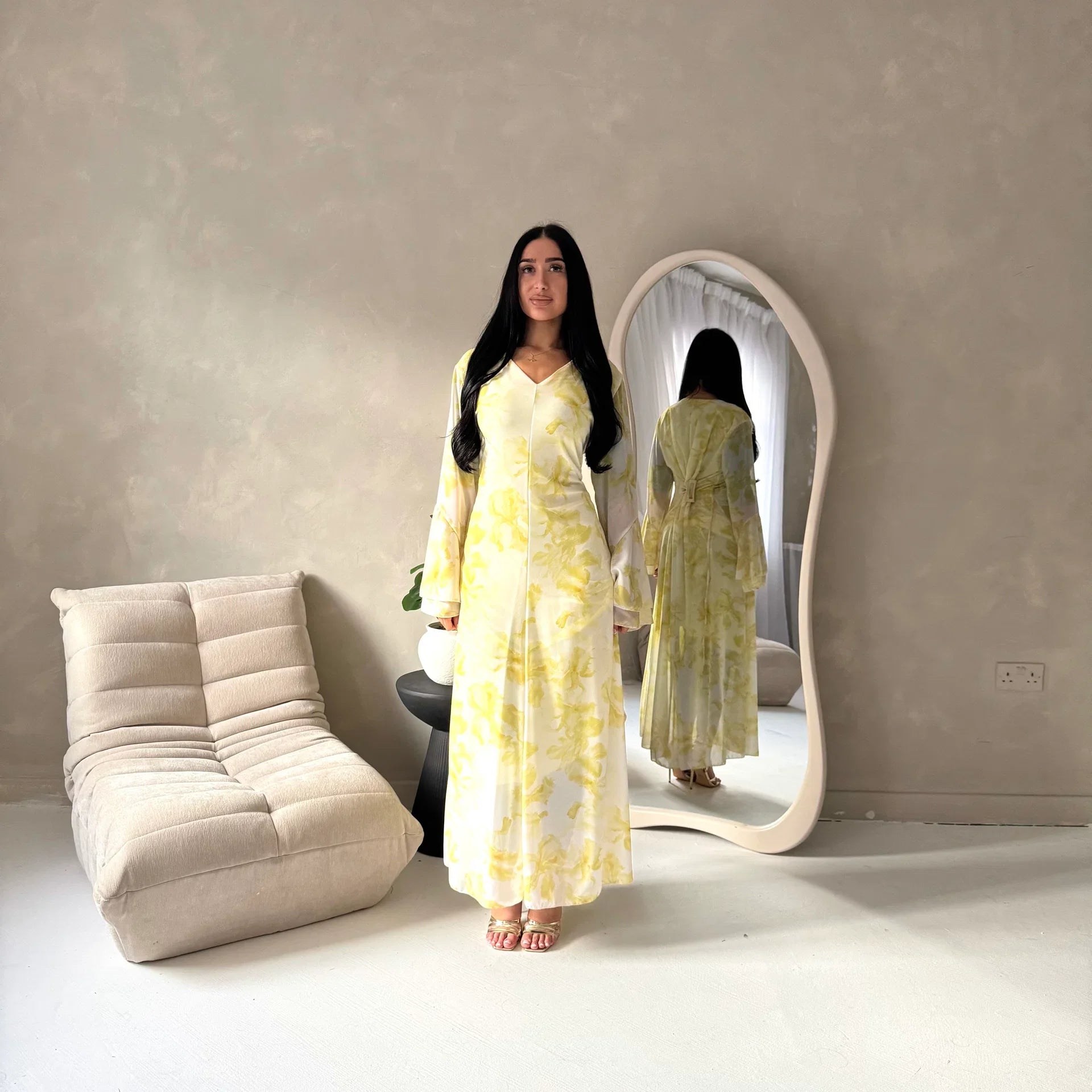 Women's elegant backless floral-lined summer dress with tie-up details