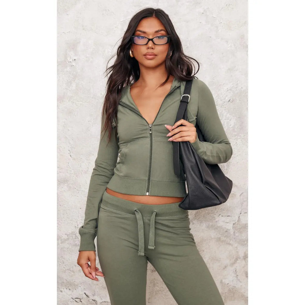Sea green zip-up slim-fit sportswear set, two-piece set including top and trousers.