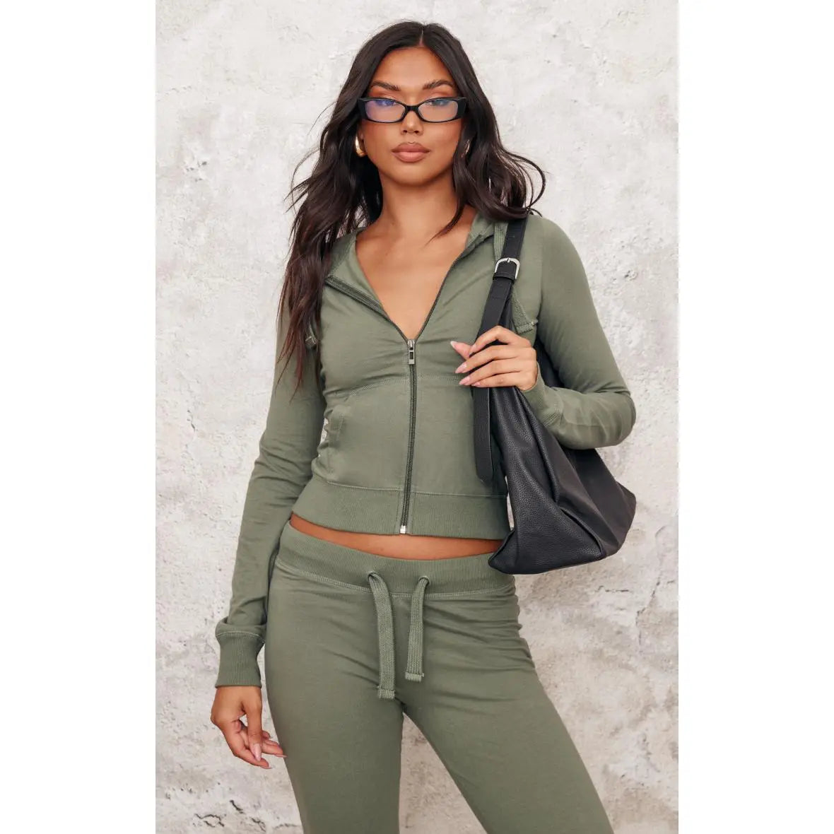 Sea green zip-up slim-fit sportswear set, two-piece set including top and trousers.