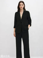 Suede Suit — Featuring a fluid, modern silhouette.