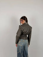 Jacket with belt at the waist