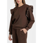 Women's tracksuit with ruffled top and trousers