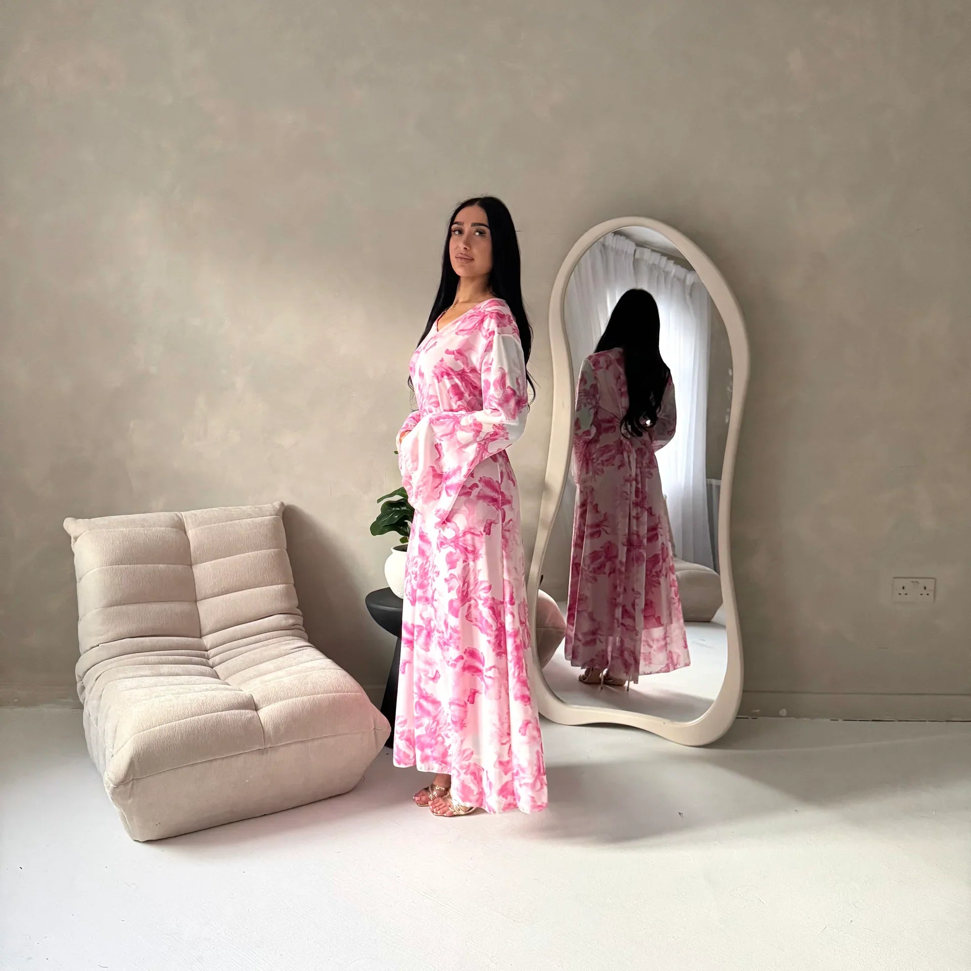Women's elegant backless floral-lined summer dress with tie-up details