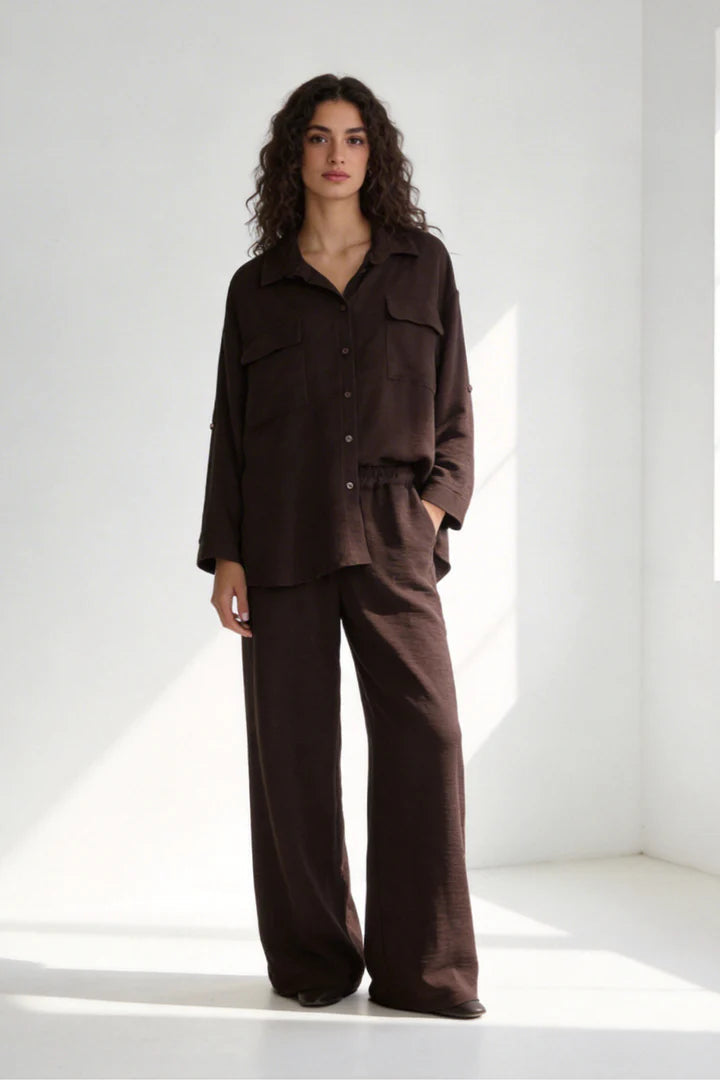 Two-piece set: loose-fitting shirt-style top, loose-fitting trousers, elastic waistband.