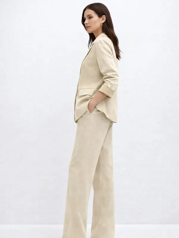 Suede Suit — Featuring a fluid, modern silhouette.