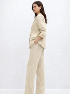Suede Suit — Featuring a fluid, modern silhouette.