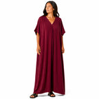 Women's long, flowy, oversized V-neck dress – chic and comfortable for summer.