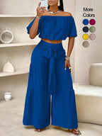Women's solid-color wide-leg pant set, casual off-shoulder top and palazzo pants for summer, beach vacation wear for women.