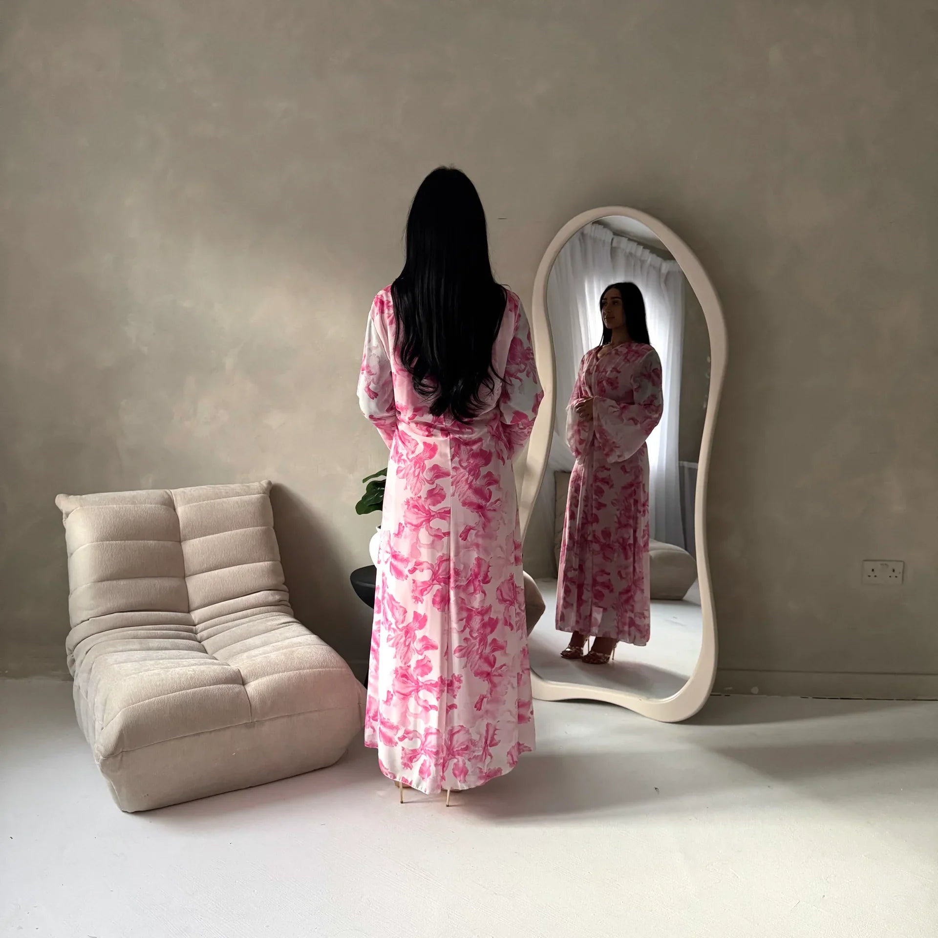 Women's elegant backless floral-lined summer dress with tie-up details