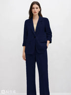 Suede Suit — Featuring a fluid, modern silhouette.