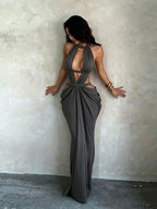 Vacation dress featuring a shimmering ribbon and cut-outs