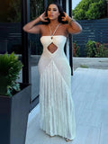 Women's crochet knit maxi dress with fringe, sexy cutout, open back, bohemian style; perfect for beach parties, summer vacations, and resort wear.