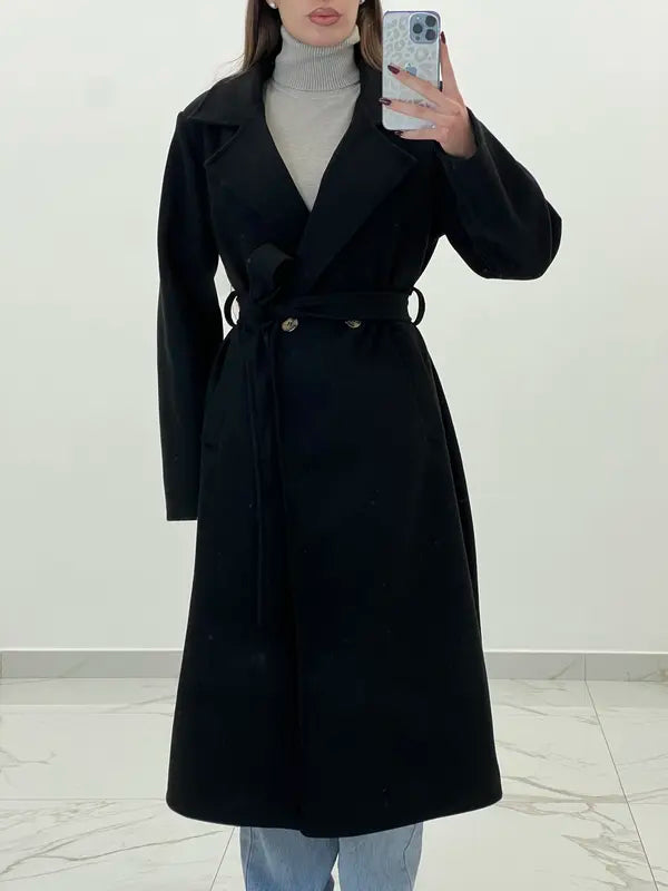 Coat with a belt at the waist