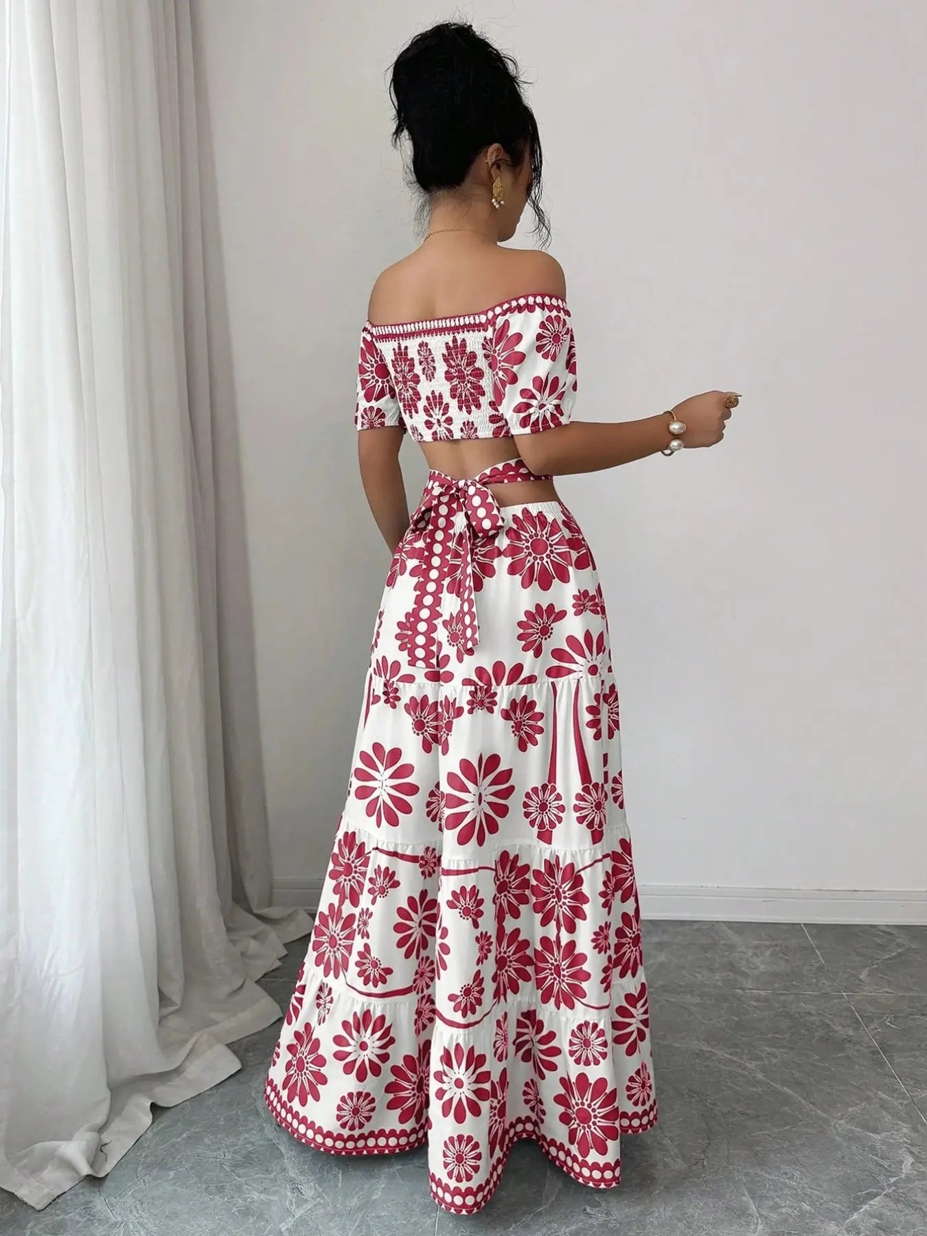 Women's off-the-shoulder short-sleeve floral dress with waist cutouts