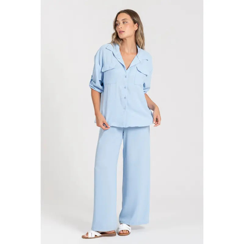Two-piece set: loose-fitting shirt-style top, loose-fitting trousers, elastic waistband.