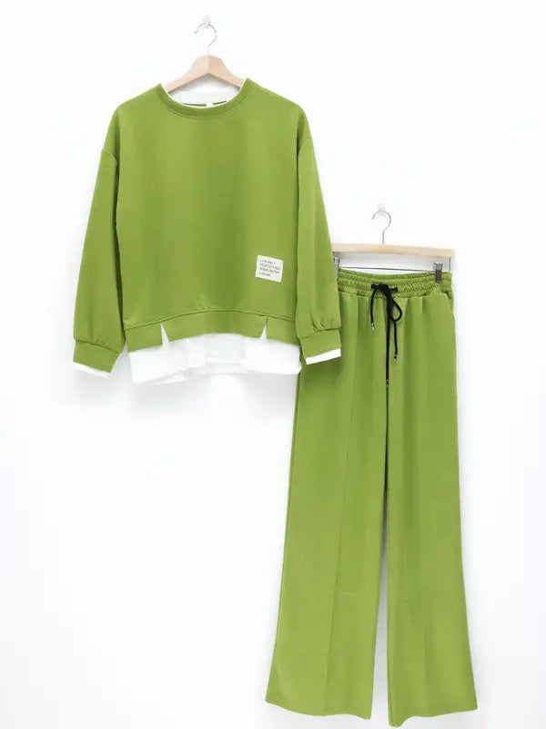 Women's tracksuit: hoodie and sweatpants, casual wear, simple straight-leg style.