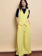 Women's suit, casual style, sleeveless jacket, loose trousers