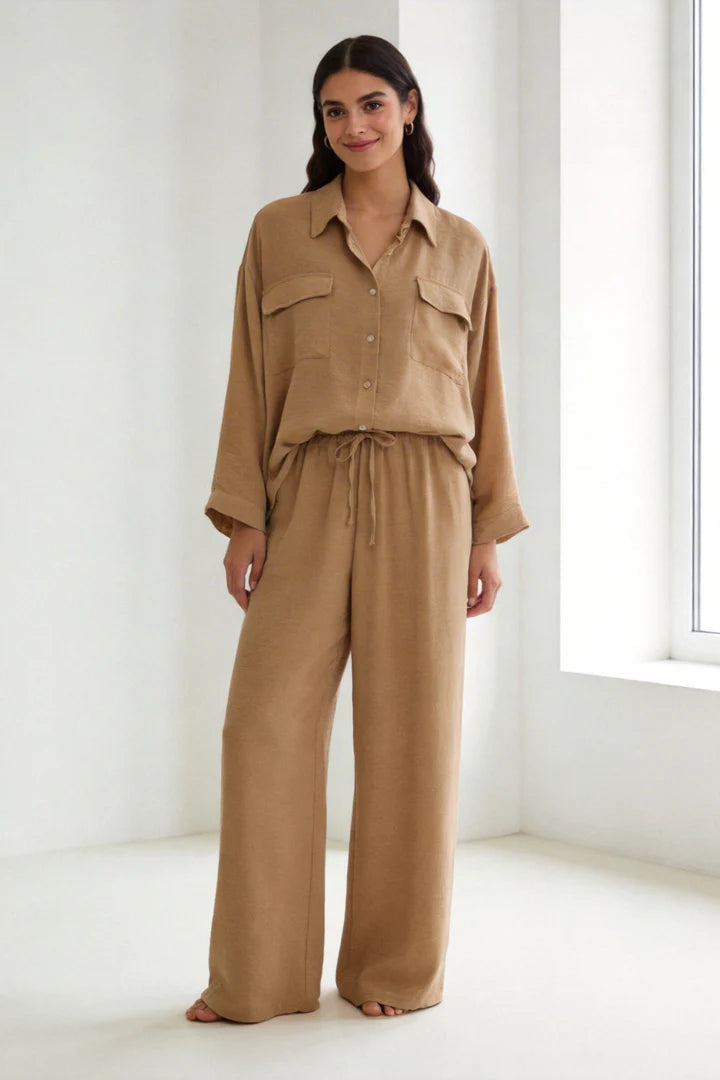 Two-piece set: loose-fitting shirt-style top, loose-fitting trousers, elastic waistband.