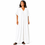 Women's long, flowy, oversized V-neck dress – chic and comfortable for summer.