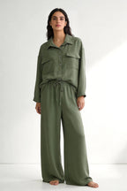 Two-piece set: loose-fitting shirt-style top, loose-fitting trousers, elastic waistband.