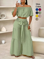 Women's solid-color wide-leg pant set, casual off-shoulder top and palazzo pants for summer, beach vacation wear for women.