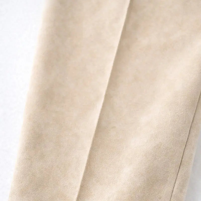 Suede Suit — Featuring a fluid, modern silhouette.