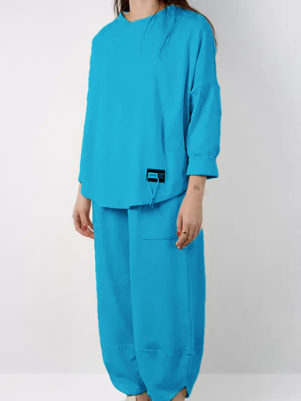 SPRING two-piece set consisting of a shirt and trousers made of soft and compact fabric