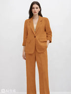 Suede Suit — Featuring a fluid, modern silhouette.
