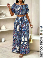 Women's solid-color wide-leg pant set, casual off-shoulder top and palazzo pants for summer, beach vacation wear for women.