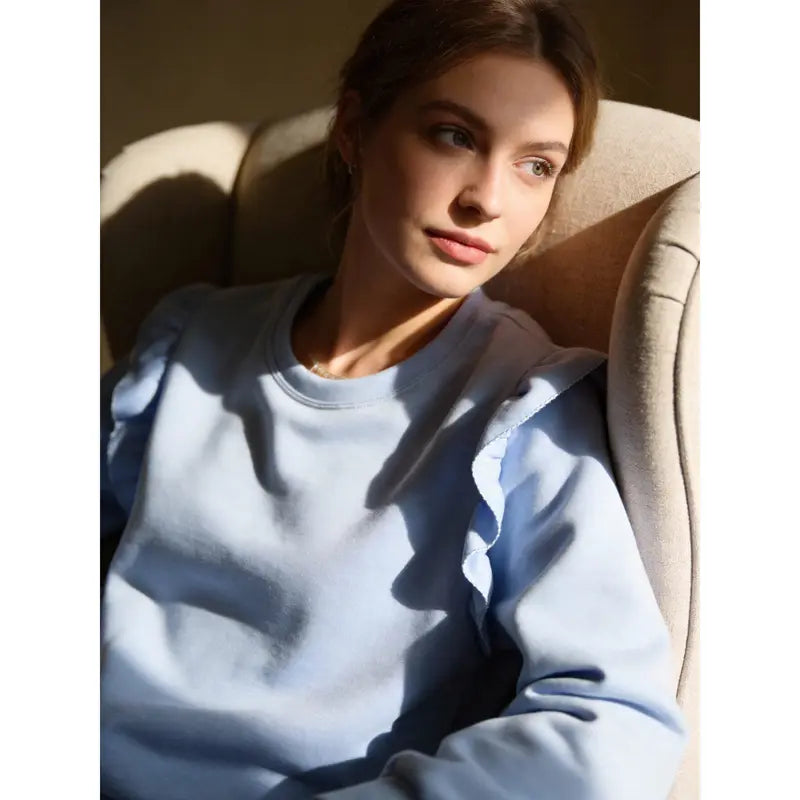 Women's tracksuit with ruffled top and trousers