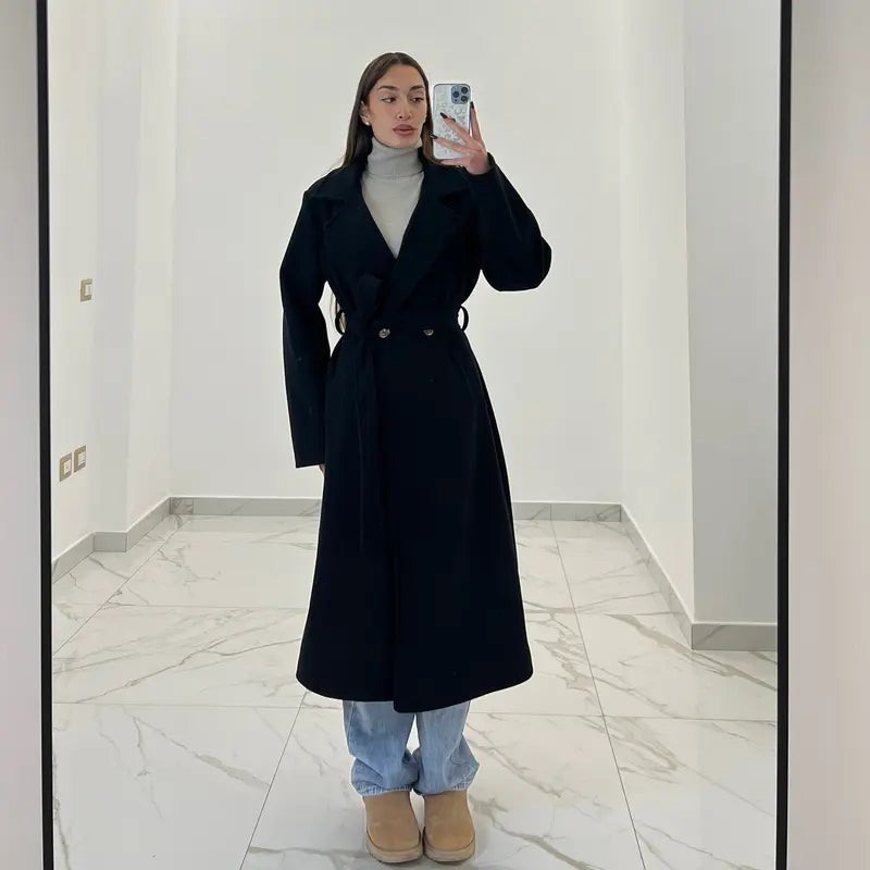 Coat with a belt at the waist