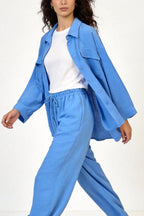 Two-piece set: loose-fitting shirt-style top, loose-fitting trousers, elastic waistband.