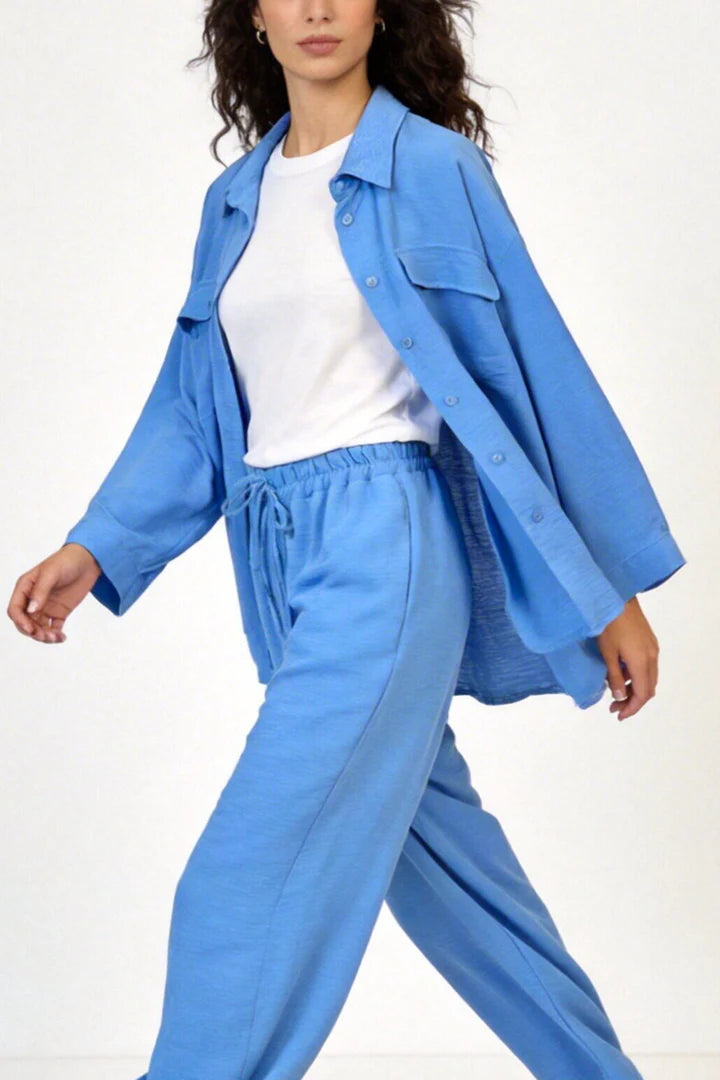 Two-piece set: loose-fitting shirt-style top, loose-fitting trousers, elastic waistband.