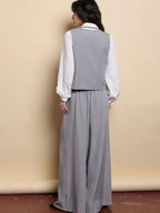 Women's suit, casual style, sleeveless jacket, loose trousers