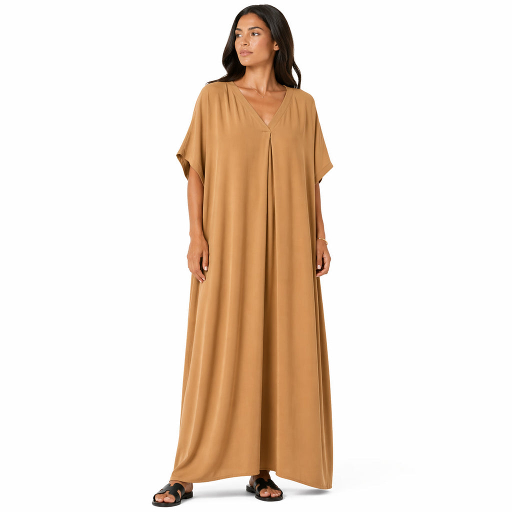 Women's long, flowy, oversized V-neck dress – chic and comfortable for summer.