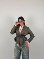 Jacket with belt at the waist