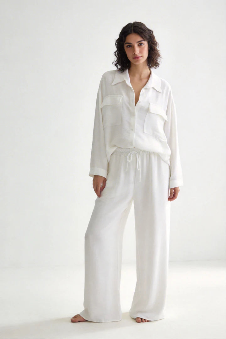 Two-piece set: loose-fitting shirt-style top, loose-fitting trousers, elastic waistband.