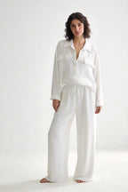 Two-piece set: loose-fitting shirt-style top, loose-fitting trousers, elastic waistband.