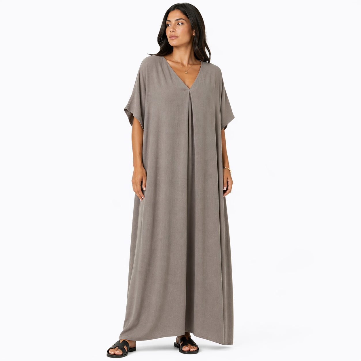 Women's long, flowy, oversized V-neck dress – chic and comfortable for summer.