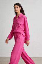 Two-piece set: loose-fitting shirt-style top, loose-fitting trousers, elastic waistband.