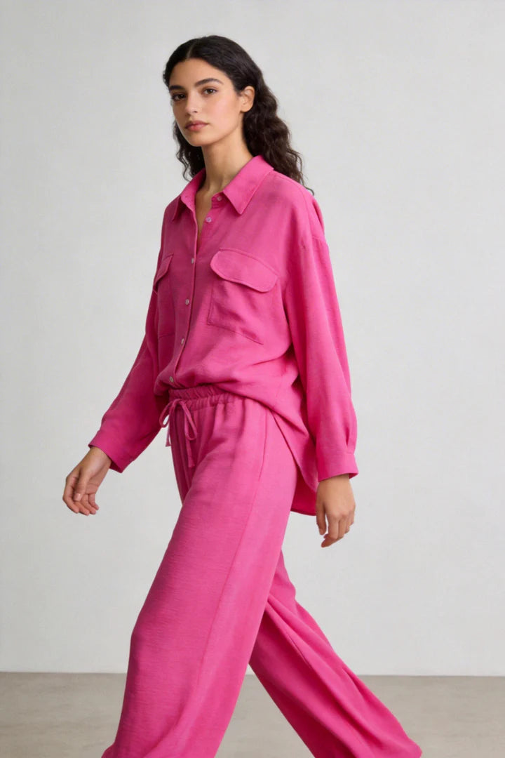Two-piece set: loose-fitting shirt-style top, loose-fitting trousers, elastic waistband.