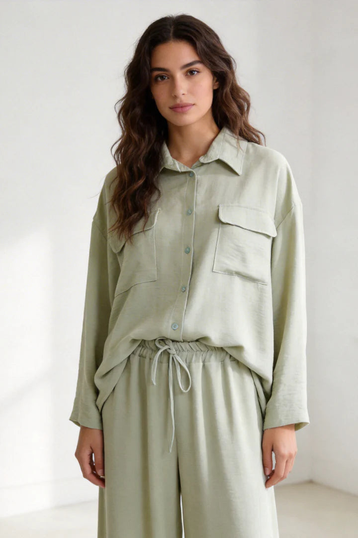 Two-piece set: loose-fitting shirt-style top, loose-fitting trousers, elastic waistband.