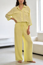 Two-piece set: loose-fitting shirt-style top, loose-fitting trousers, elastic waistband.