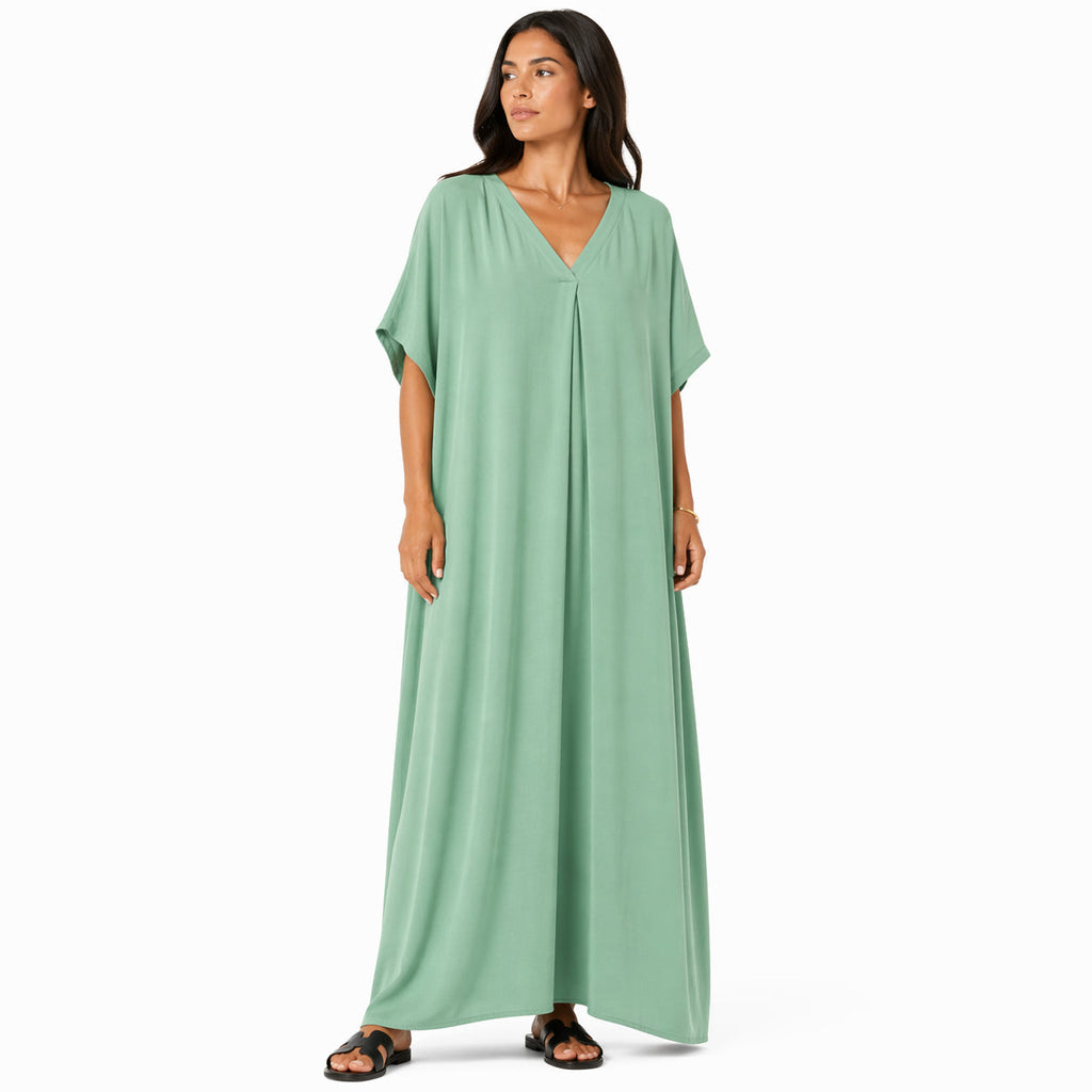 Women's long, flowy, oversized V-neck dress – chic and comfortable for summer.
