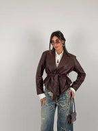 Jacket with belt at the waist
