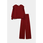 Women's tracksuit with ruffled top and trousers