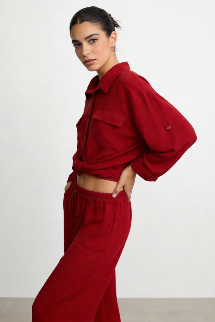 Two-piece set: loose-fitting shirt-style top, loose-fitting trousers, elastic waistband.