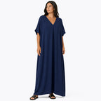 Women's long, flowy, oversized V-neck dress – chic and comfortable for summer.